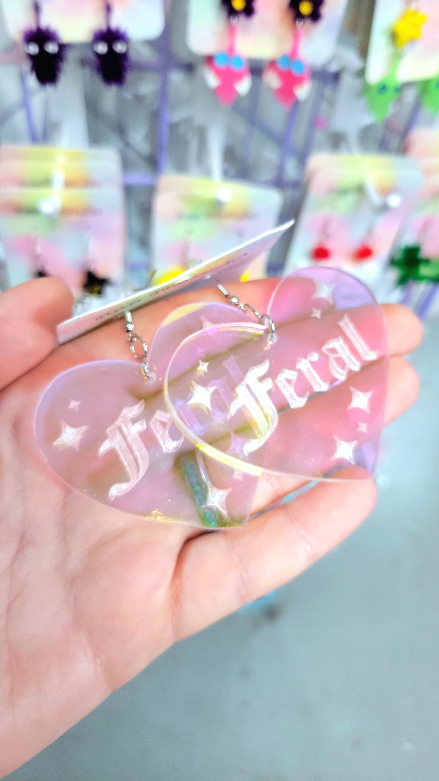 Feral Holographic Heart Earrings Word